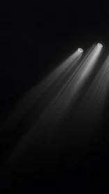 Dual overhead spotlights casting converging beams downward.