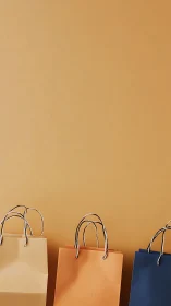 Quiet trio of shopping bags on caramel daydream backdrop.