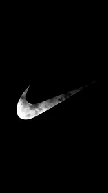 Nike swoosh logo styled with moon-like crater texture.