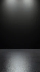 Minimalist dark studio backdrop with reflective floor surface.