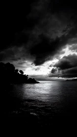 High-contrast monochrome seascape captures storm-lit horizon