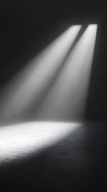 Twin spotlights cut darkness over textured concrete floor.