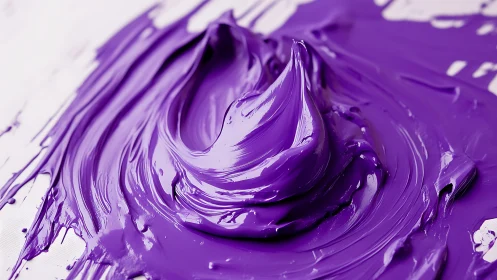 Vivid violet paint swirl in thick impasto texture study.