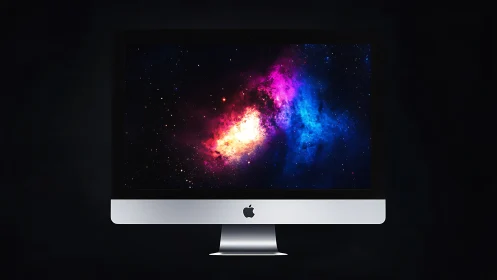 Radiant galaxy glows across a sleek desktop computer screen