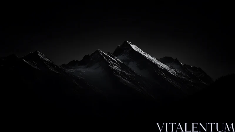 Moonlit ridge rising from ink-black mountain silence.