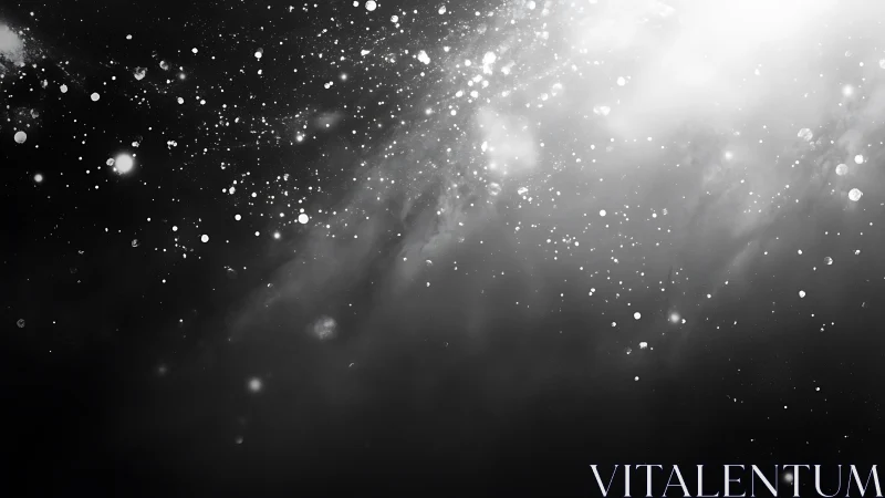 Starry monochrome dust cloud drifts through deep darkness.