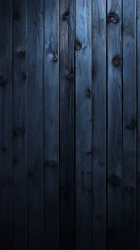 Moody navy wood planks glow gently in soft side light