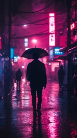 Silhouette with umbrella on neon lit rainy city street.