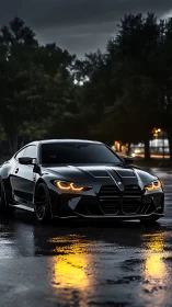 Black sports coupe on wet urban street at dusk.