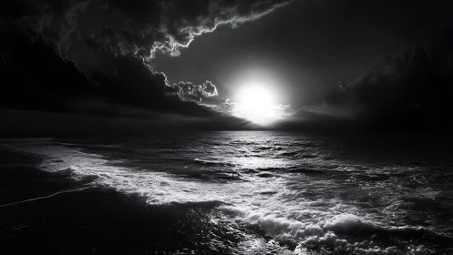 Monochrome ocean horizon shows bright sun through heavy clouds