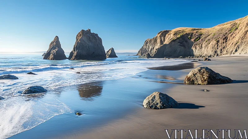 Shoreline monoliths under clear coastal morning light.