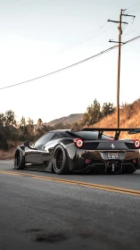 Widebody Ferrari 458 with aero kit on sunlit canyon road.