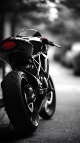 Rear perspective of modern sport motorcycle on city street.