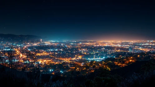 City skyline glows with vivid orange blue night lights