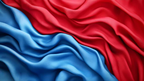 Flowing Red and Blue Fabric Abstract Art with Soft Folds.
