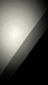 Soft hallway light spilling gently into shadowed calm.