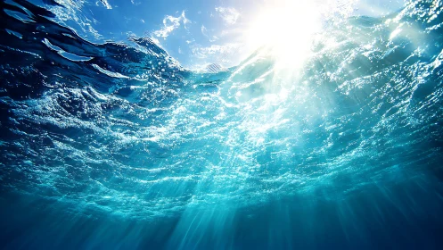 Sunlit ocean waves welcoming you into a blue daydream.