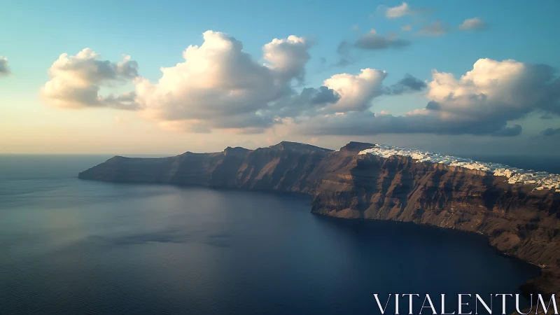 Santorini Cliffs at Sunset. Whitewashed Village Overlooks Aegean Sea.