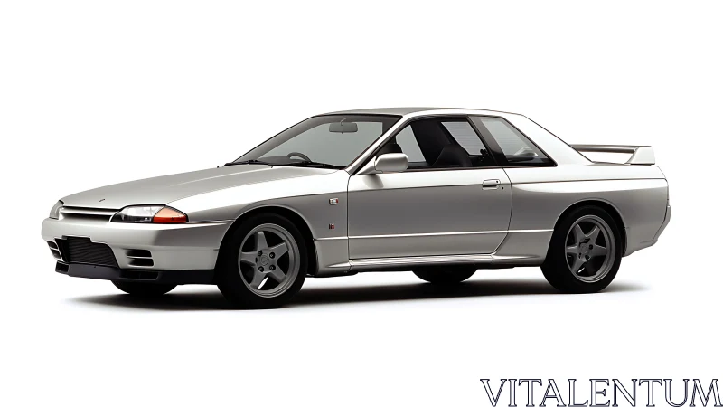Silver two-door coupe on white background in side profile.