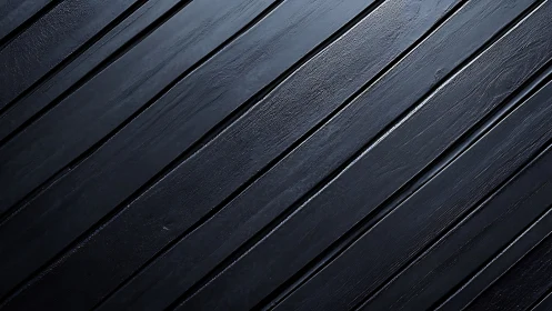 Dark diagonal wooden planks forming sleek minimal surface.