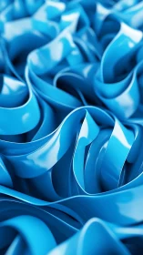 Glossy blue abstract ribbons with smooth folded curves.