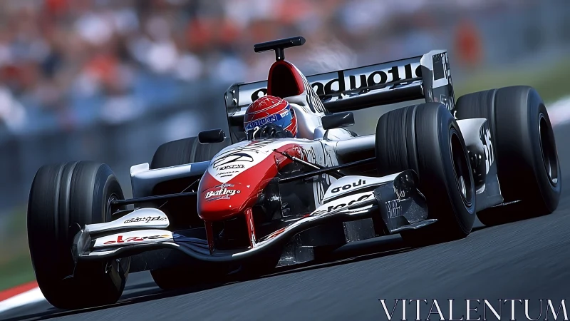 Red-tipped thunderbolt F1 car carving heat into tarmac.