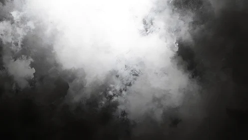 Monochrome vapor cloud gradient with central overexposed core.