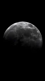 Crescent moon rises from deep black space background