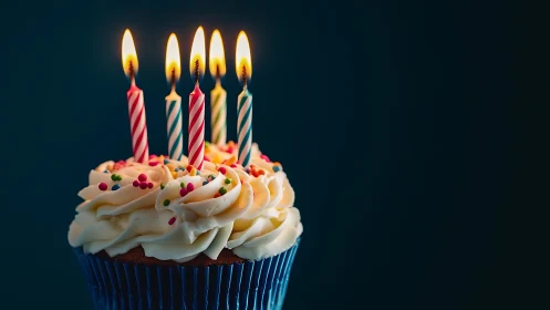 Birthday Cupcake with Glowing Candles Celebrates the Joy