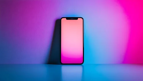 Modern Smartphone Glowing Against Vibrant Gradient Background.
