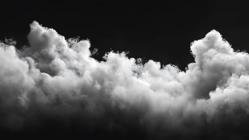 Monochrome cumulonimbus cloudscape under dramatic light.