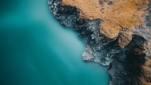 Shoreline fractals sketch bold borders between stone and teal