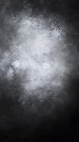 Dense gray fog texture fills frame with soft light center