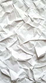 Rumpled paper peaks quietly mimic a minimal mountain range