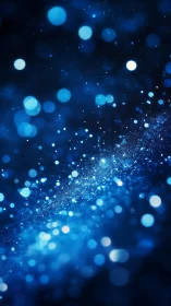 Midnight nebula of glittering blue bokeh stars.