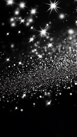 Diagonal cascade of luminous white bokeh particles on black