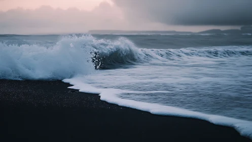 Moody breaking wave on dark shoreline, low light seascape study.