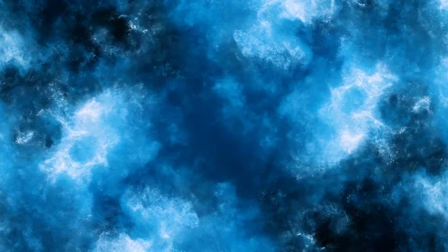 Nebulous blue energy cloud with luminous core focus.