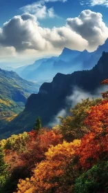 Autumn mountains glow beneath rolling clouds and distant mist.
