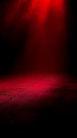 Crimson spotlight floods a lonely stage of shadow and mystery.
