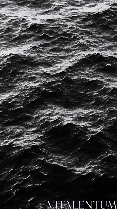 Midnight waves carve silver veins across a restless sea.