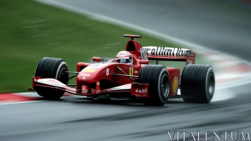 Red formula racer charging through a slick, misty circuit.