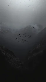 Brooding ravens crossing misted mountain chasm at dusk.