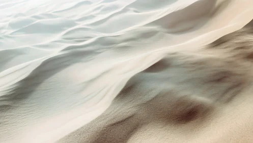 Whispering dune waves drifting in soft desert daylight.