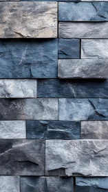 Textured blue slate masonry wall with staggered stone courses.