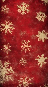 Gold snowflakes on distressed red festive background.