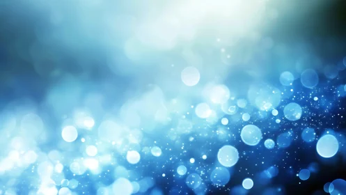 Luminous blue bokeh lights drift softly in a tranquil glow