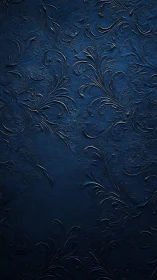 Dark blue embossed floral plaster wall shows ornate relief