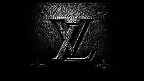 Embossed XL monogram on black textured leather surface