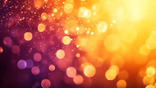 Vibrant abstract bokeh light background in warm orange and purple tones.
